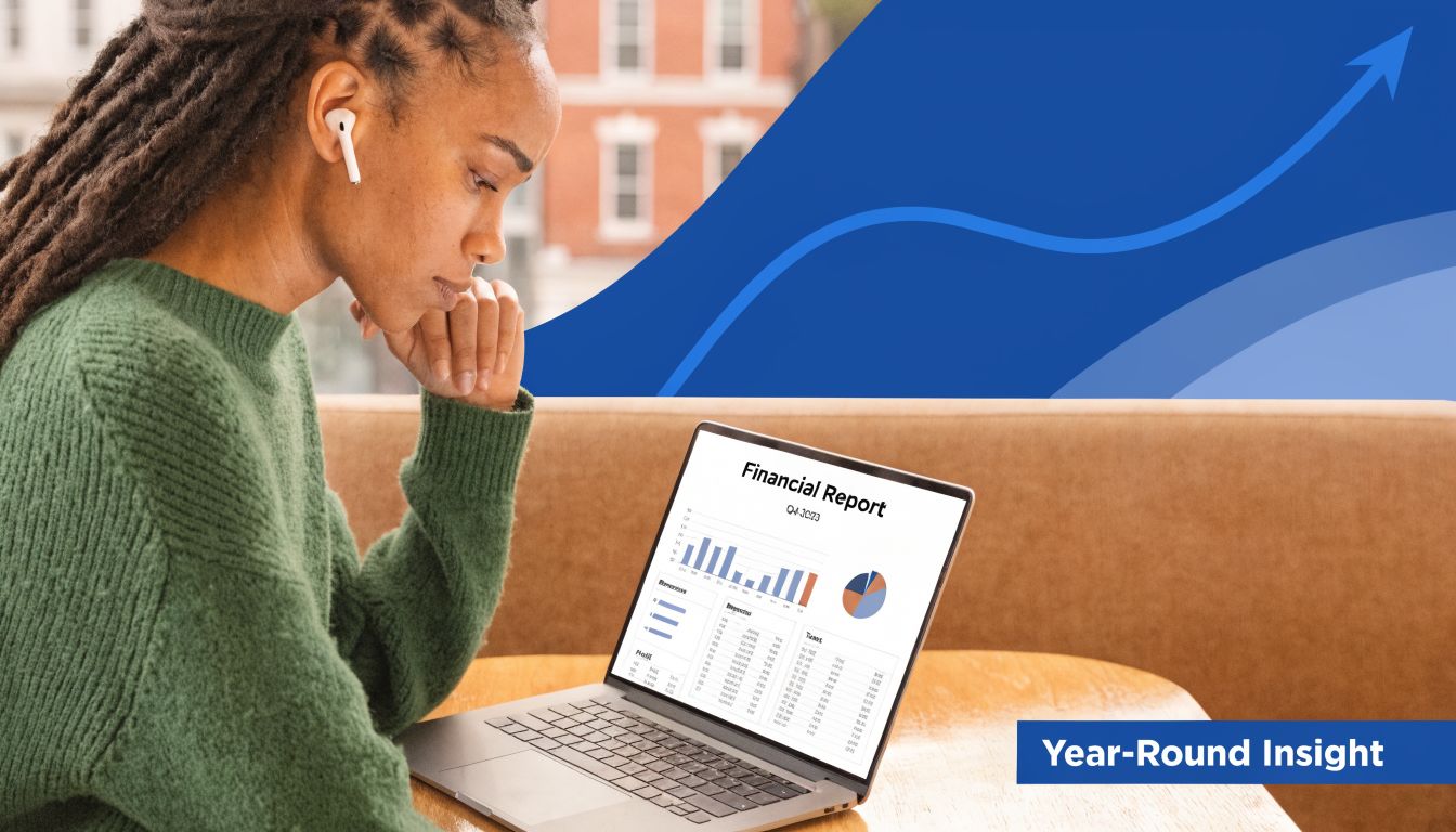 A young woman working on her laptop reviewing a Q4 2023 financial report in a cafe.